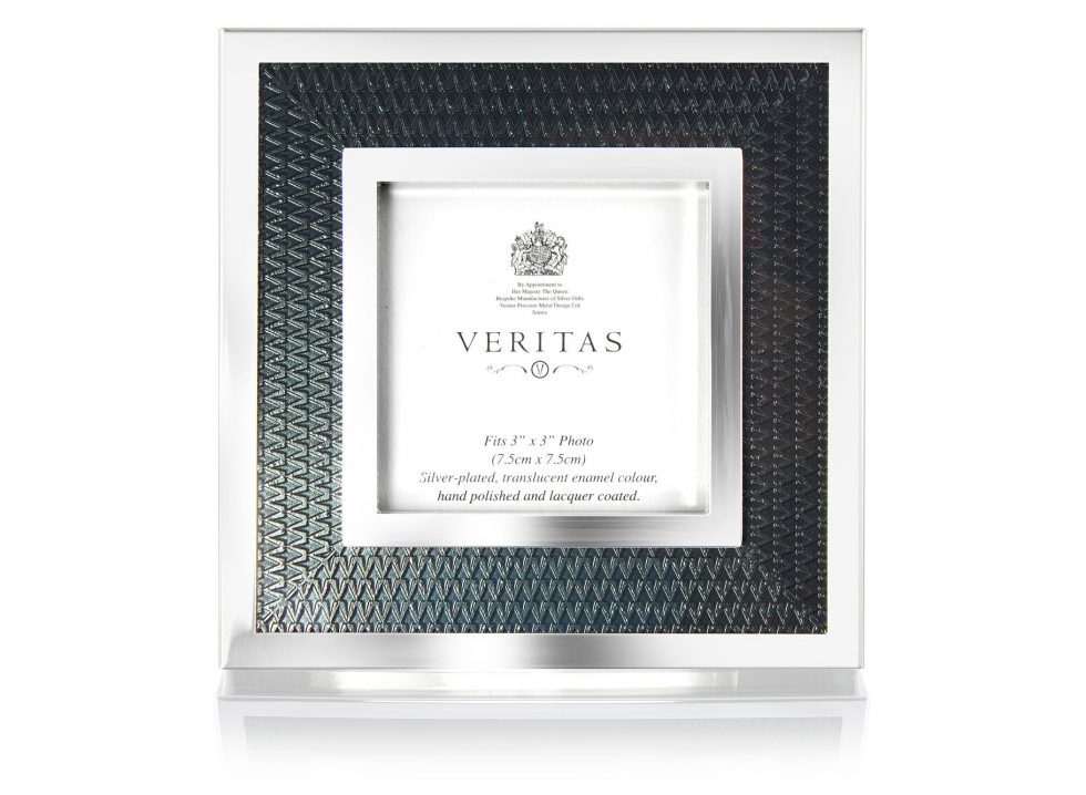 Silver And Patterned Steel Photo Frame